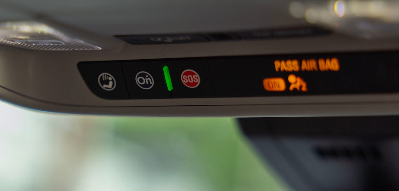 Close-up view on the OnStar button activated.