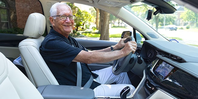 Man in his car ready to drive