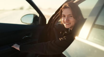 Women Stepping out of Her Vehicle