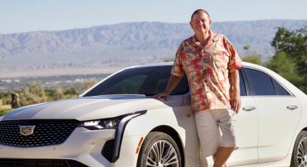 Rusty Austin standing next to his 2021 Cadillac CT4