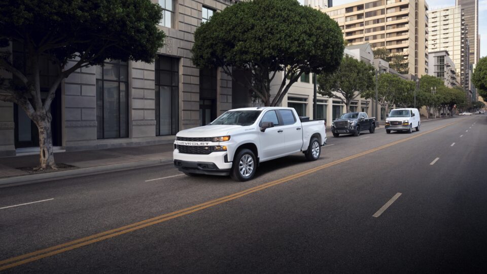 Truck Driving Through City Streets