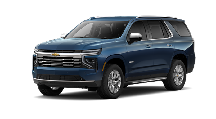 A lakeshore blue metallic Chevrolet Tahoe Premier SUV, featuring Super Cruise for advanced hands-free driving.
