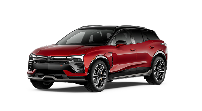 A red Chevrolet Blazer EV SUV, a Super Cruise compatible electric vehicle, shown in a studio setting.