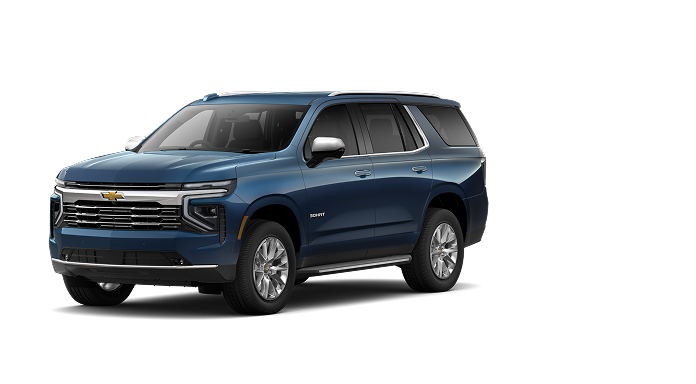 A lakeshore blue metallic Chevrolet Tahoe Premier SUV, featuring Super Cruise for advanced hands-free driving.