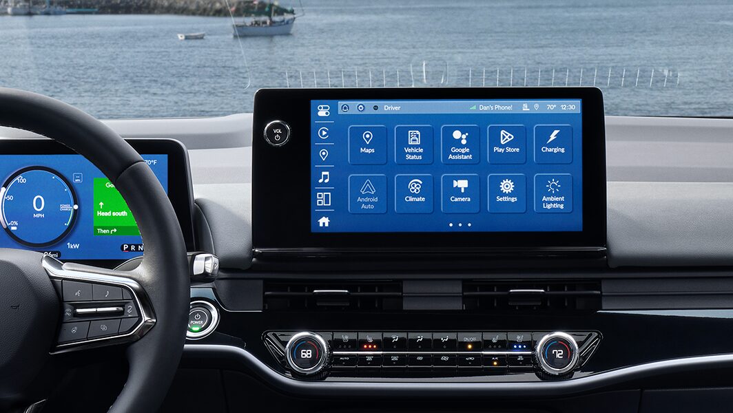Close-up of the infotainment system in a Honda vehicle displaying Google Built-In