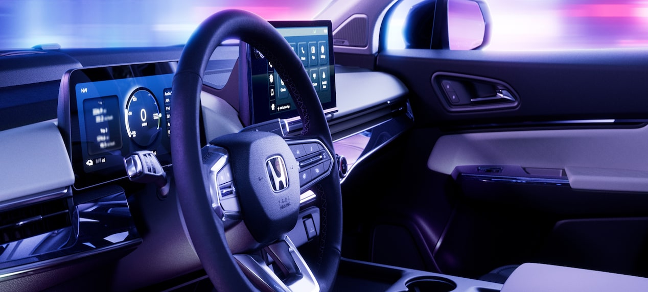 Drivers' side view of the interior dashboard of a vehicle