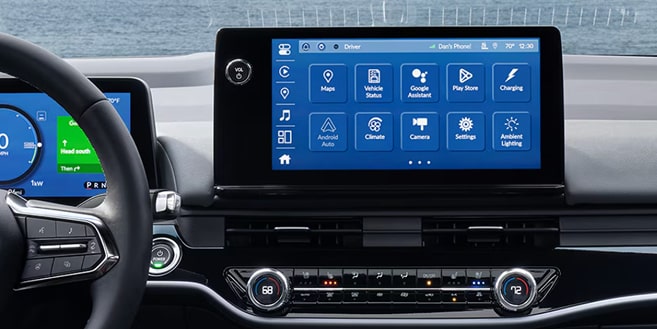 Close-up of the infotainment system in a Honda vehicle displaying Google Built-In