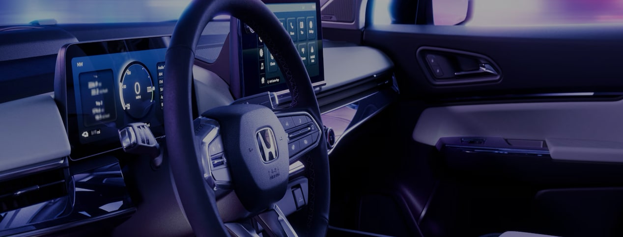 Drivers' side view of the interior dashboard of a vehicle