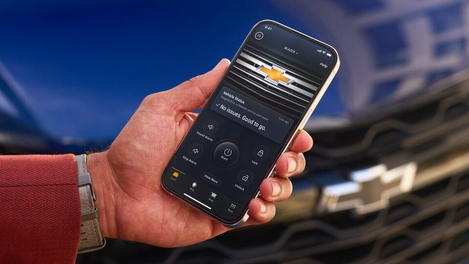 Close up of a customer using the myChevrolet app on a smartphone