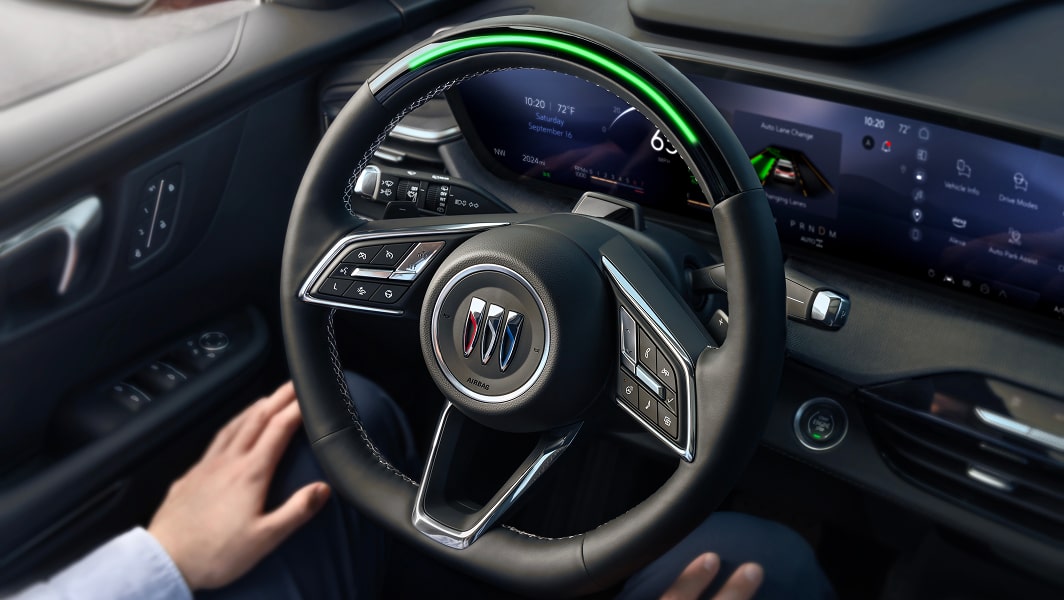 A close view of a Buick steering wheel.
