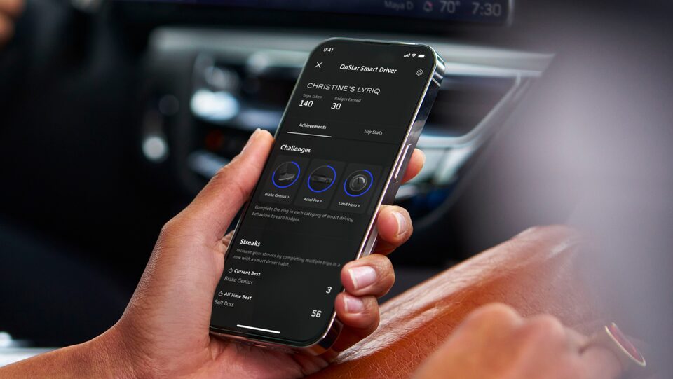 Woman using OnStar Smart Driver