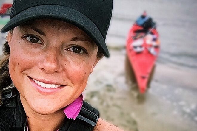 Headshot of Jill Brown with Kayak in Background