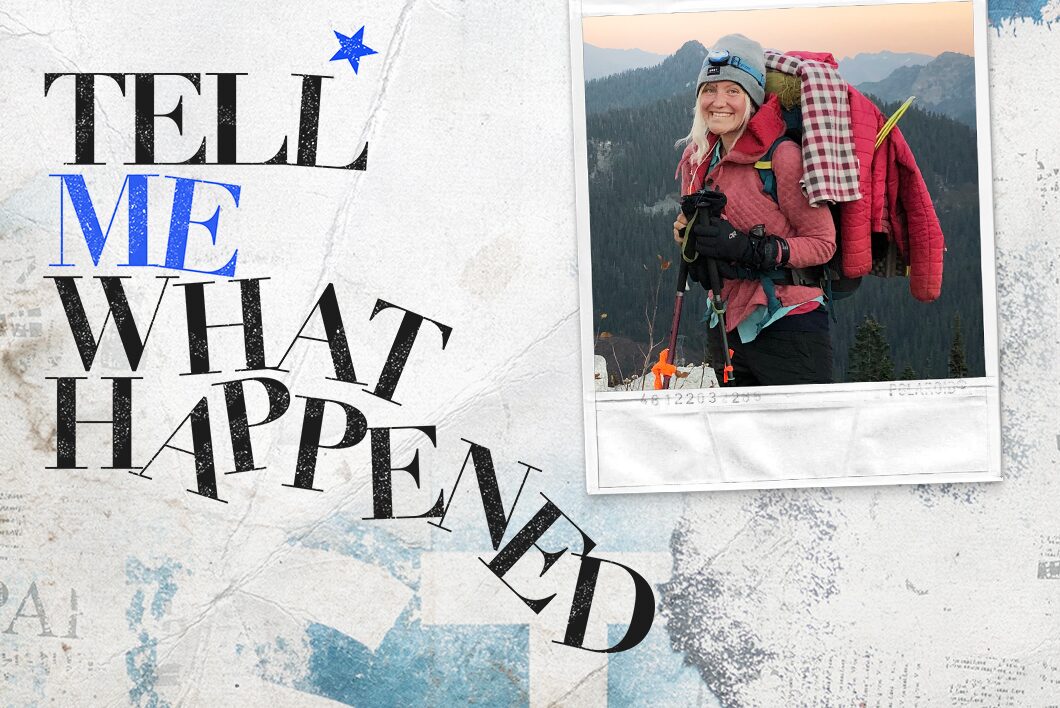 An image of a woman on top of a mountain with winter traveling gears next to the text overlay of "Tell Me What Happened".