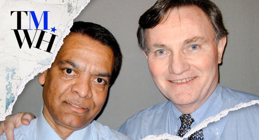 Two men next to each other taking a close-up shot next to the text overlay of "Tell Me What Happened".
