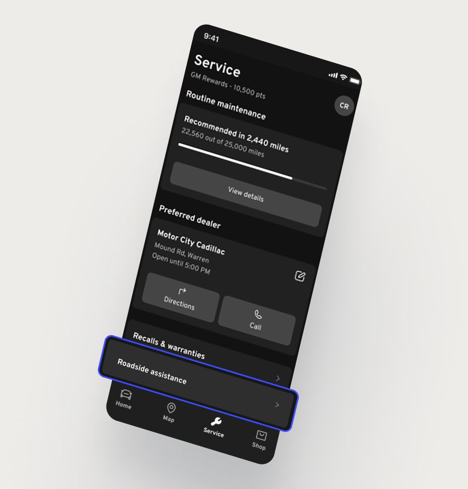 A smartphone displays the mobile app with a "Roadside Assistance" button highlighted at the bottom of the screen.