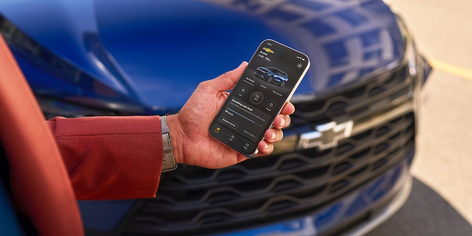 Person Standing in Front of Vehicle using myChevrolet Mobile App