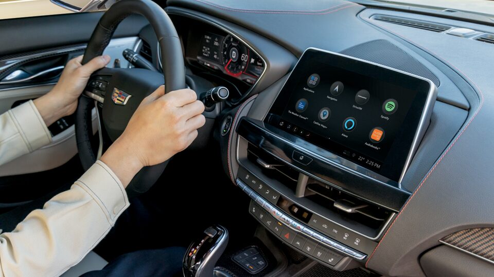 Close Up of Driver's Hands on a Cadillac Steering Wheel