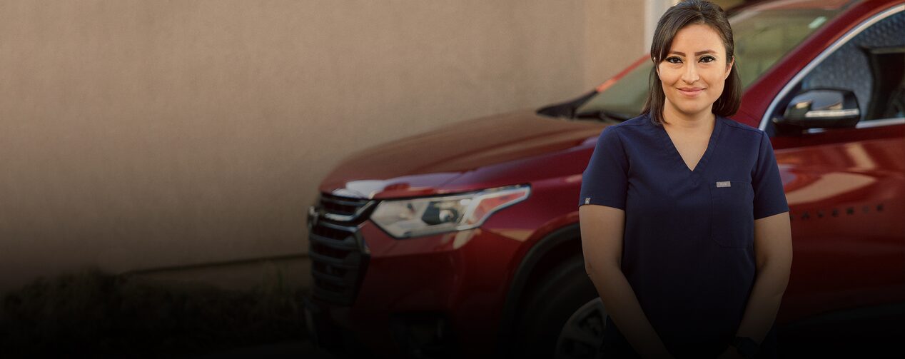Glenis Espejo Standing Next to her Chevy Traverse
