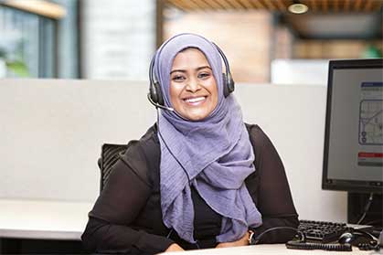 A smiling OnStar advisor