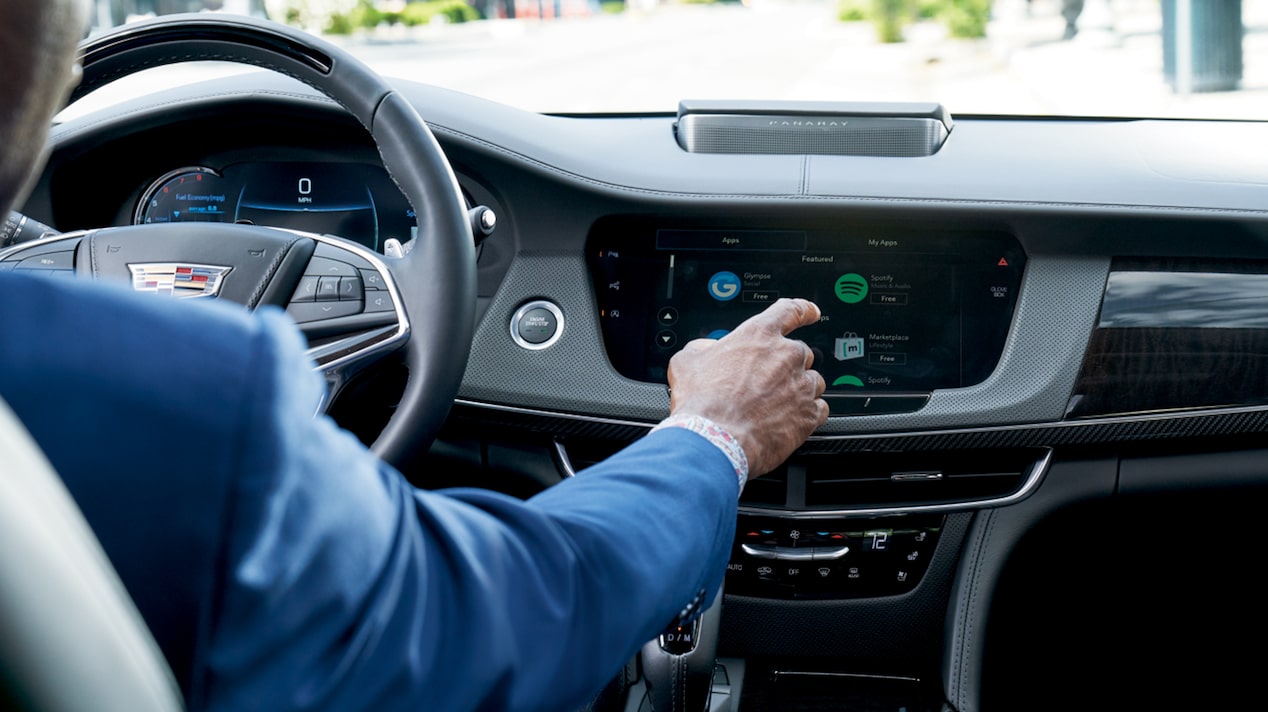 Cadillac Driver Presses Infotainment Screen
