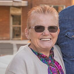 Roxanne Miller Smiles at the Camera