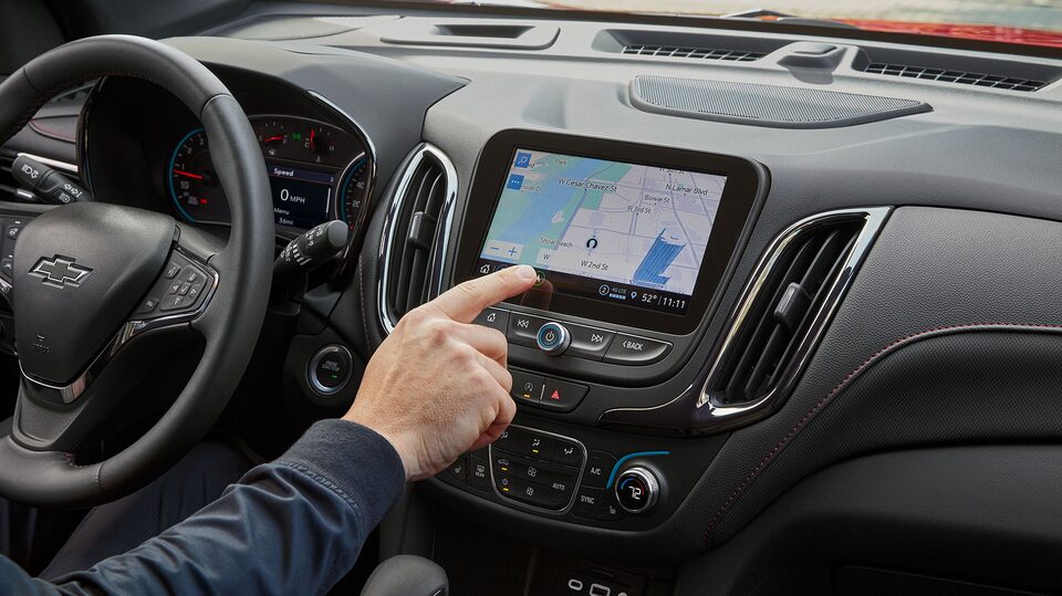 Close-Up of Male Hand Pressing the Infotainment Screen