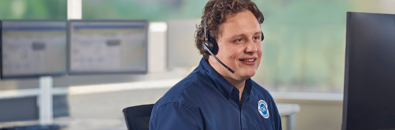 Male OnStar Advisor Wearing Headset