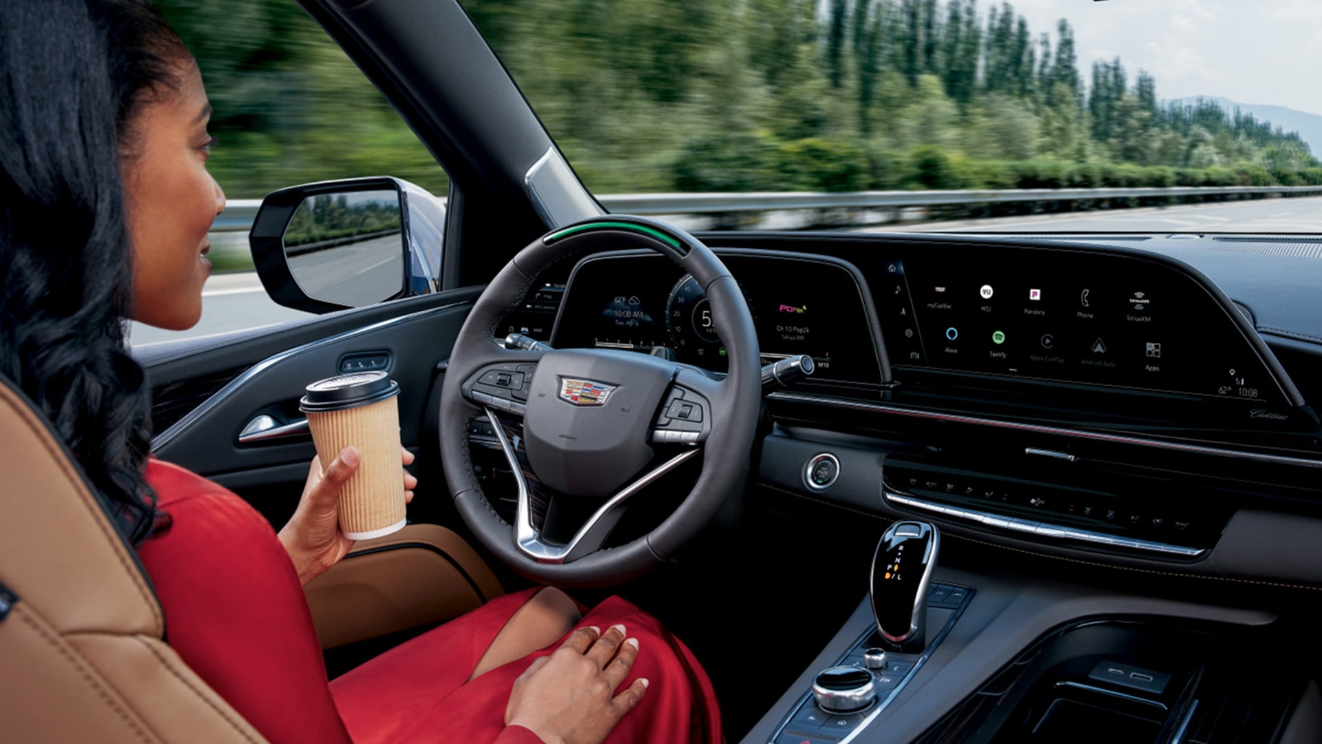 Cadillac Super Cruise LiDar map technology being used by a women driving a 2024 Lyriq EV without hands on wheel
