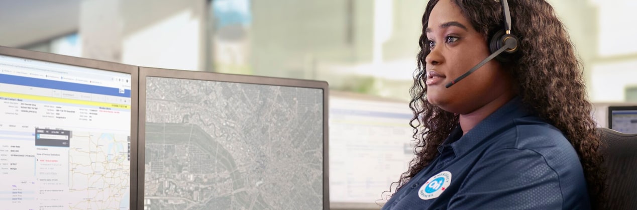 Woman OnStar Advisor Speaking into Headset