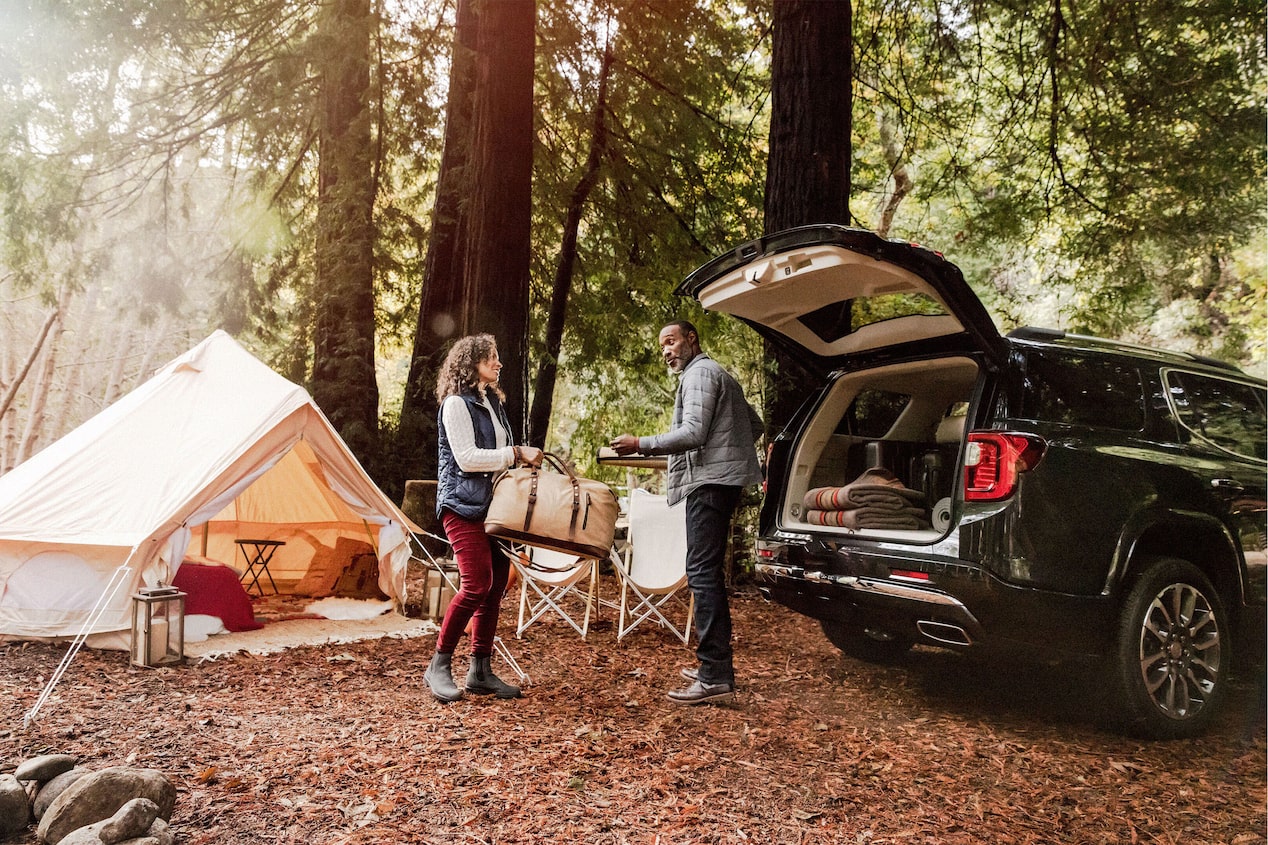 Camping & Unloading Supplies from GM SUV