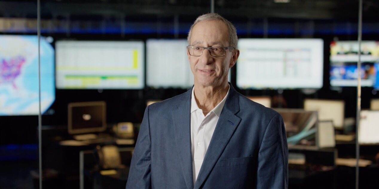 Medical Director In Front of Multiple Monitors