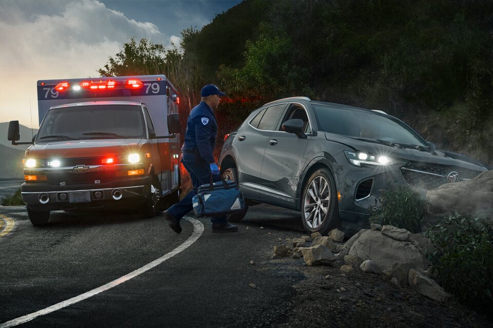 EMT Quickly Moving to Vehicle on the Side of the Road
